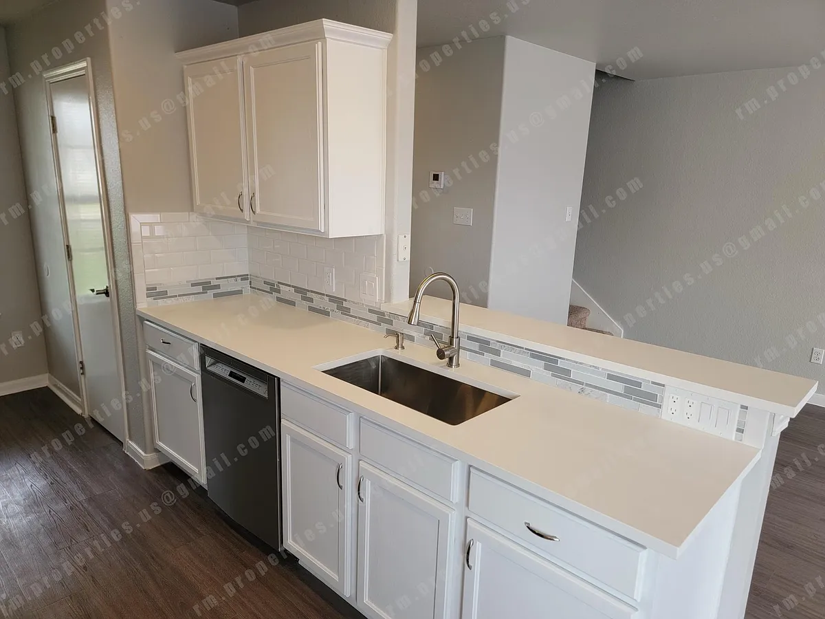 Large sink with new plumbing fixtures and a soap dispenser. - 2874 Southampton Way #A