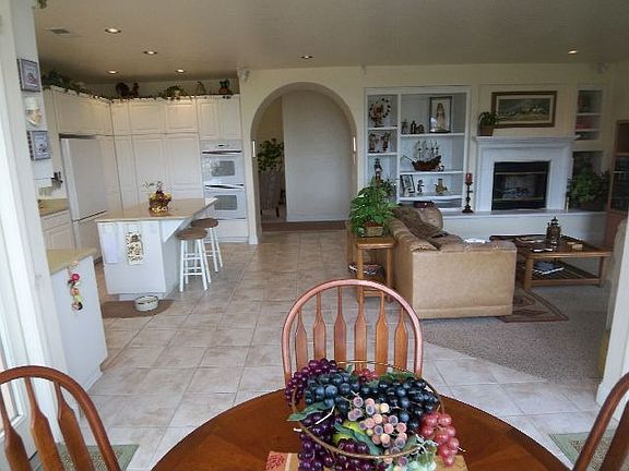 Partial view of family room and kitchen