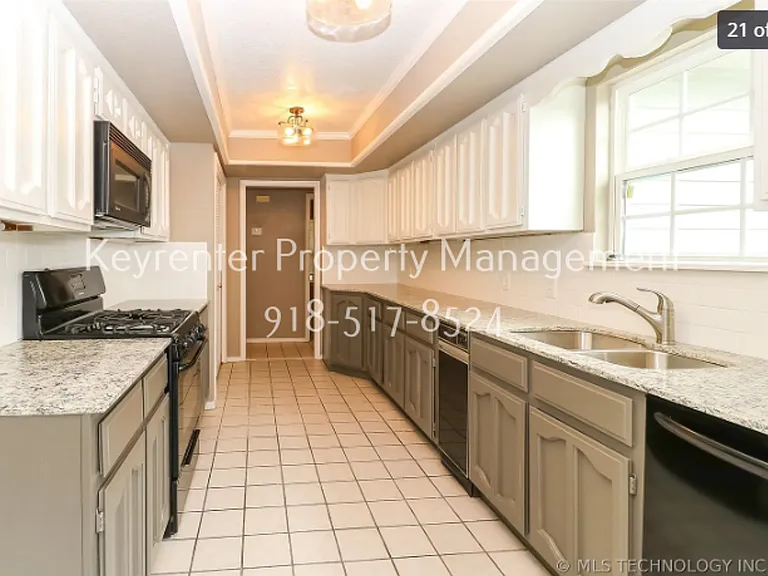 7737 S Trenton Ave — Photo 47