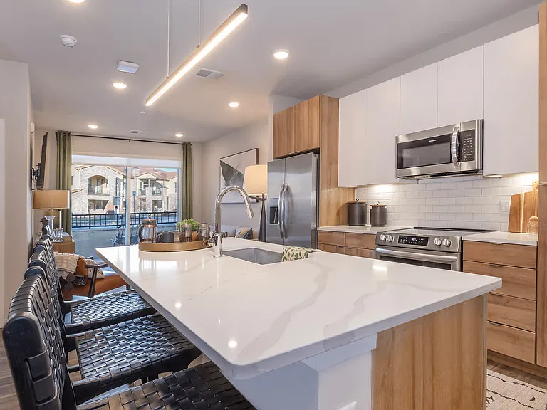 Kitchen with Stainless Steel Appliances and Quartz Countertops