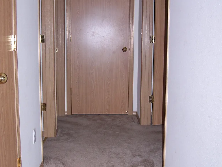 Upstairs hall, door at the end of the hall is to the laundry room.