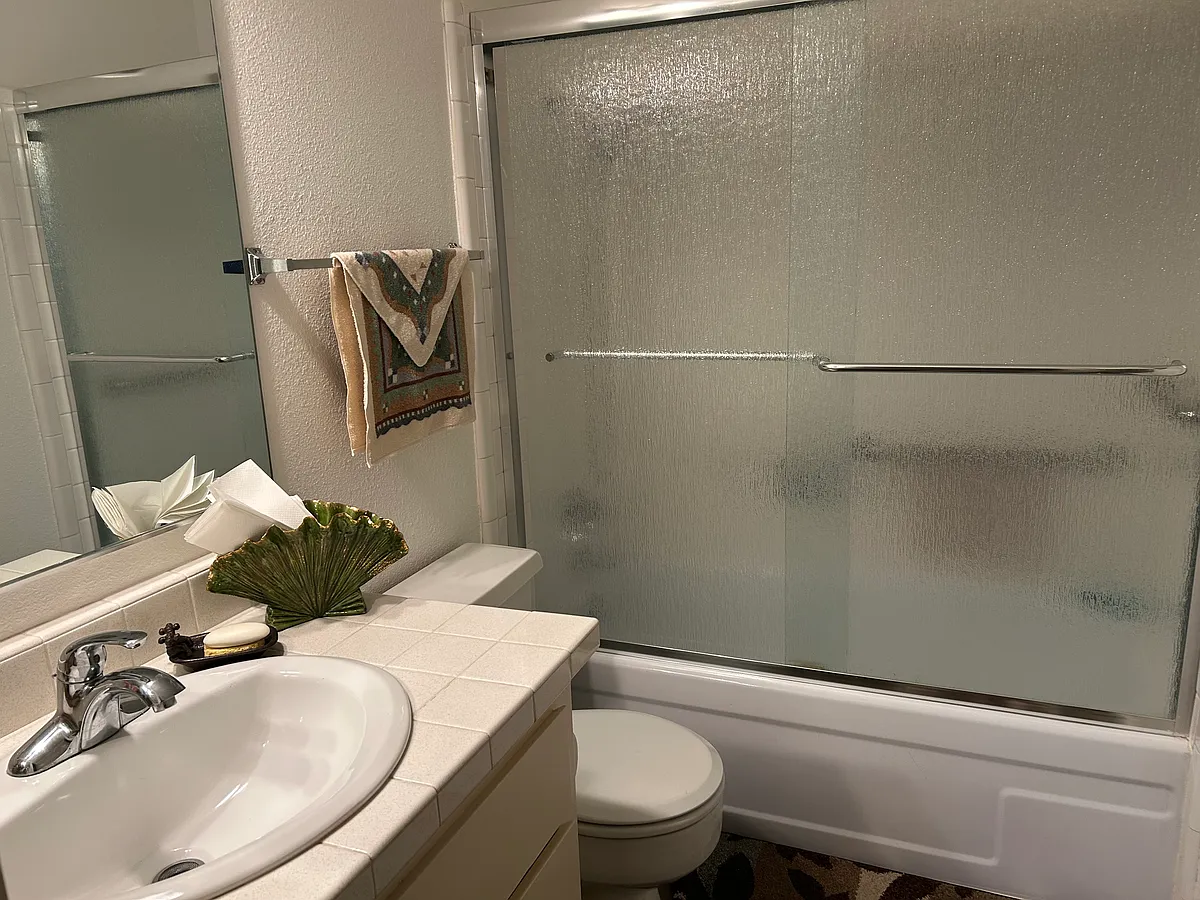 Fully furnished tenant bathroom with full shower and tub - 1321 Webster St #D102