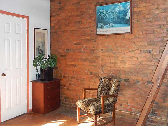 Corner of room; loft steps