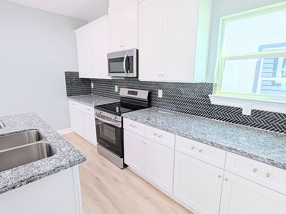 Oversized cabinets give plenty of storage options.