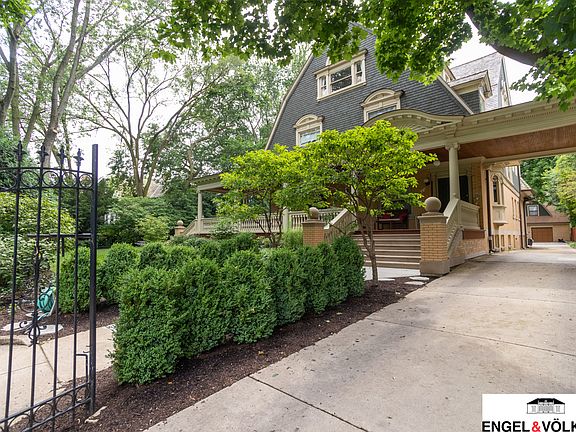 Front Facade at Side Drive on Forest Avenue and driveway acts as access to
 apartment entry at the rear of the home.