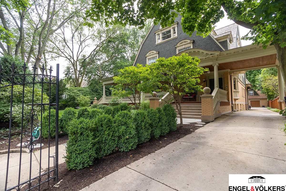 Front Facade at Side Drive on Forest Avenue and driveway acts as access to
 apartment entry at the rear of the home. - 1228 Forest Ave #3
