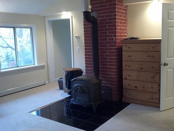 Wood burning stove in master bedroom