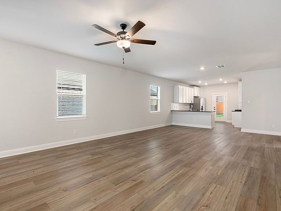 The living room is the perfect space for watching movies and lounging.