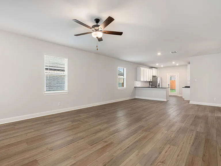 Beautiful family room with vinyl flooring.