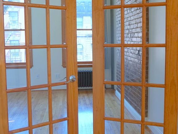 2nd image of 114 E 7th St APT 14A