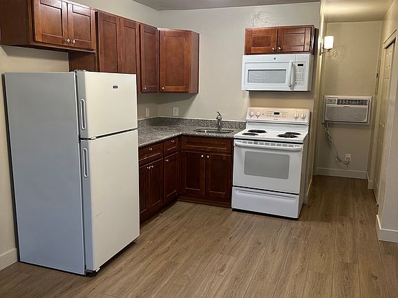Kitchen with full size appliances and self cleaning oven and microwave oven