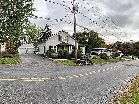 View with 2 car garage
