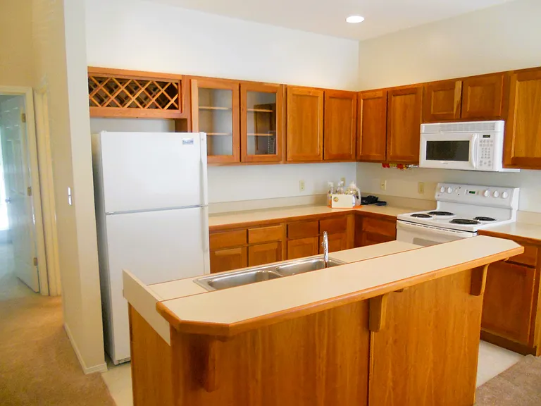 Kitchen with natural Cherry cabinets & many custom touches