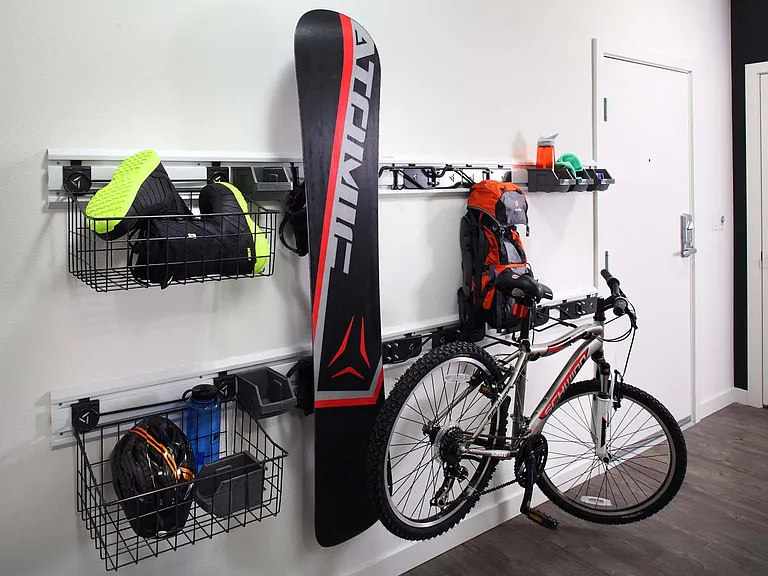 The amenity gear wall is the perfect spot to hang your gear, keeping everything organized and ready for your next adventure or workout!