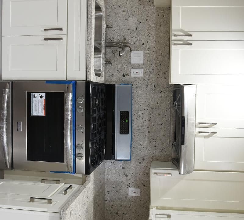 Kitchen with Quartz Counter Top and Stainless Steel Applianc