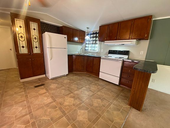 Kitchen and Stove and Fridge