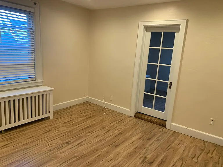 Living room with door going into second BR