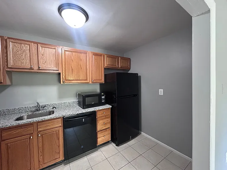 901 Woodson Rd — Photo 2