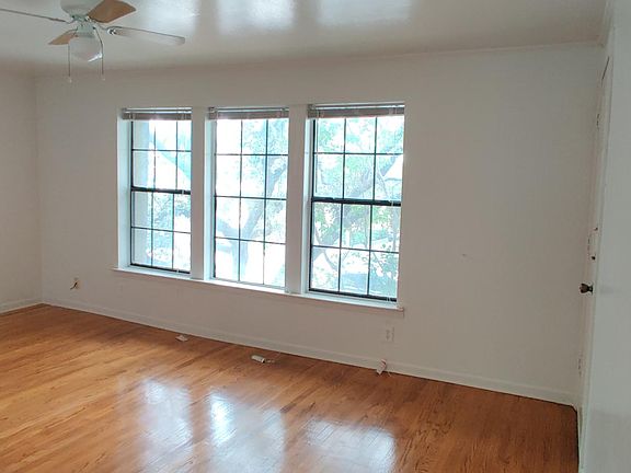 Living room with view of a Live Oak tree.