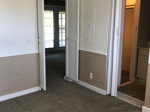 bedroom looking into bath and closet.
