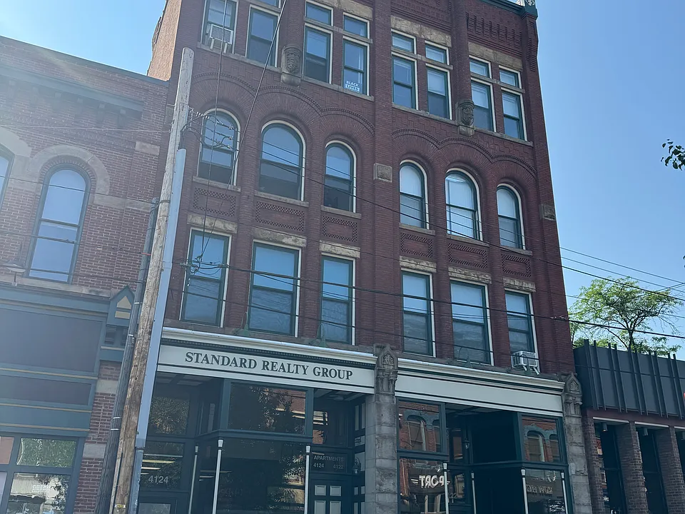 Great historic building in lawrenceville overlooking the hustle and bustle of butler street.