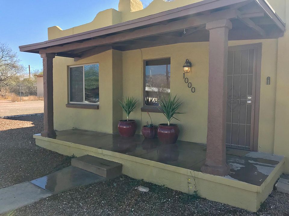 Covered porch to watch the world go by...