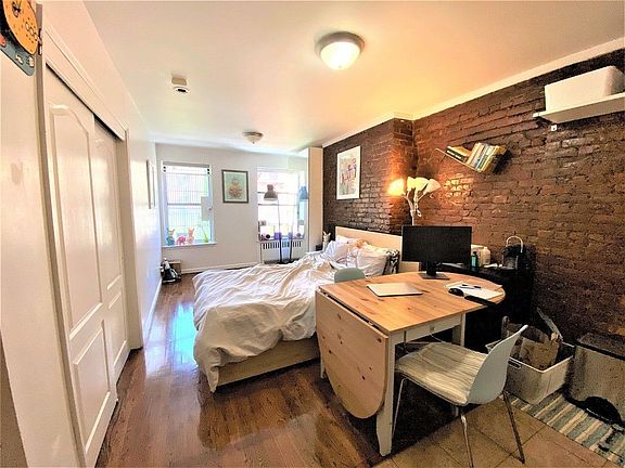 2nd image of 237 E 2nd St APT 4c