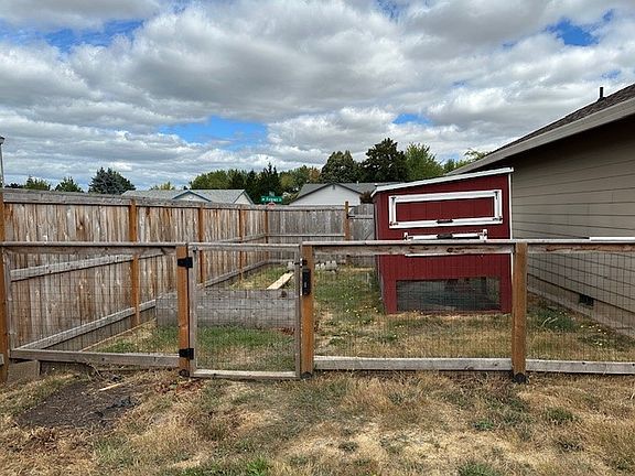 Separate enclosure for chickens with custom coop (included)