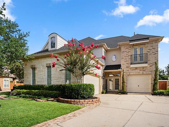 Stacked stone elevation and a 3 car garage. Meticulously maintained home with attention to detail on an over-sized beautifully landscaped lot.