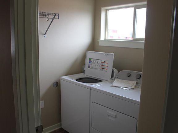 Laundry room includes washer and dryerl
