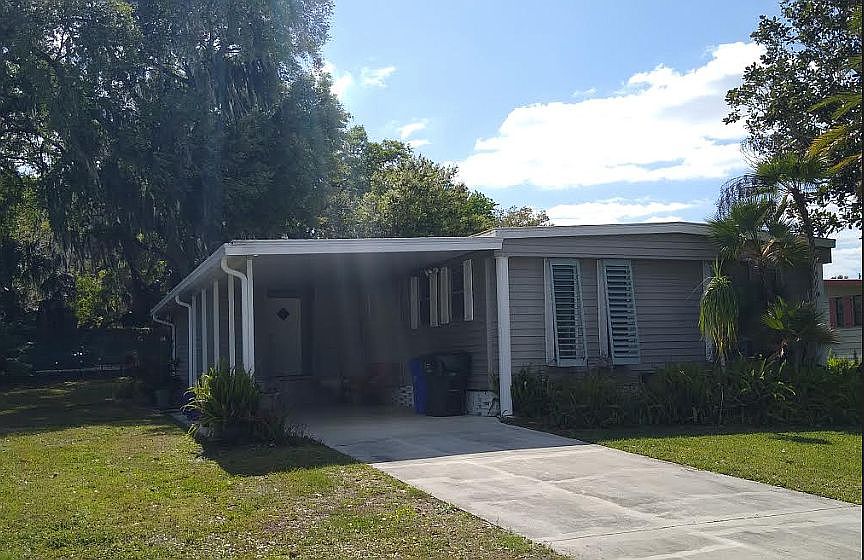 Driveway, carport and front 