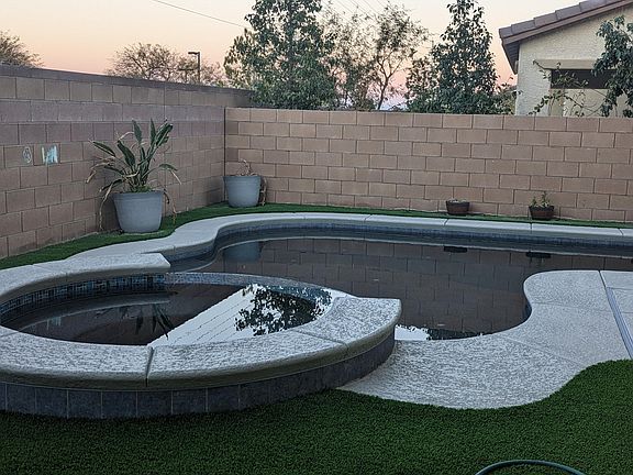 Pool and spa view from covered patio