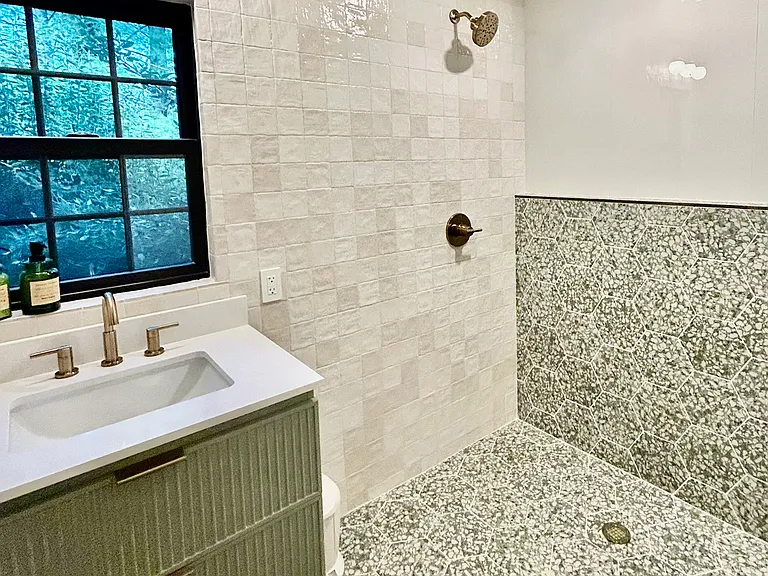 handicap accessible powder/shower on the main floor.