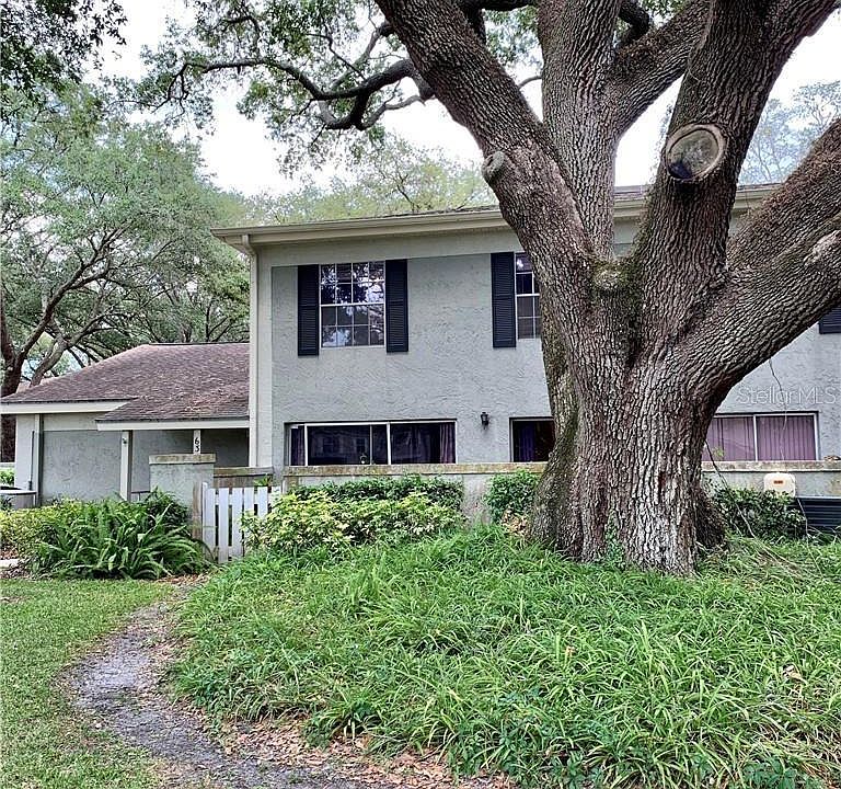 Two-story townhome. Lots of oak trees in the community