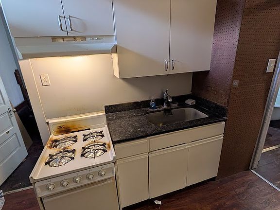 Kitchen with granite counters (stove is getting replaced)