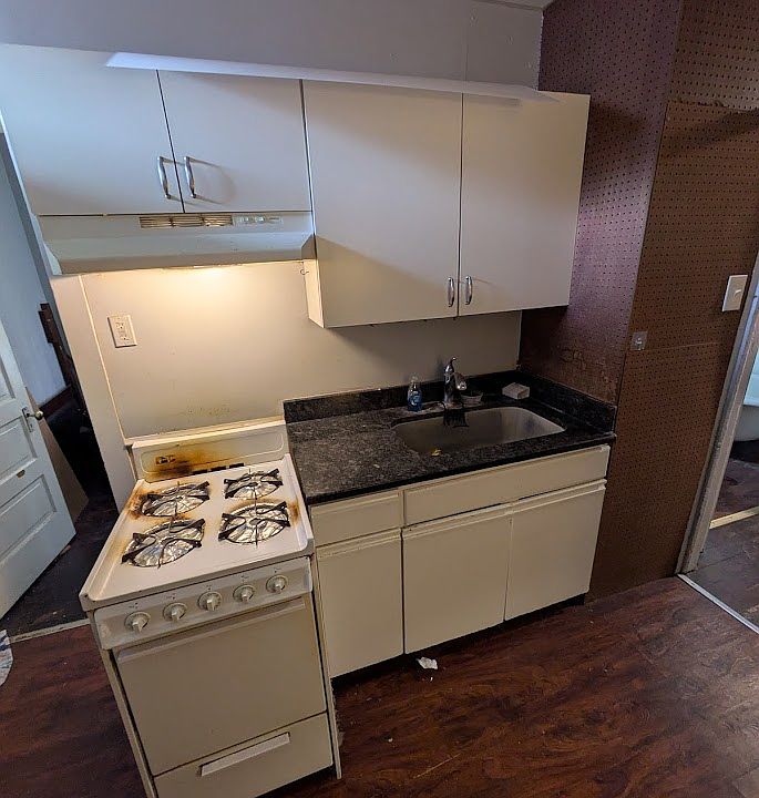 Kitchen with granite counters (stove is getting replaced)