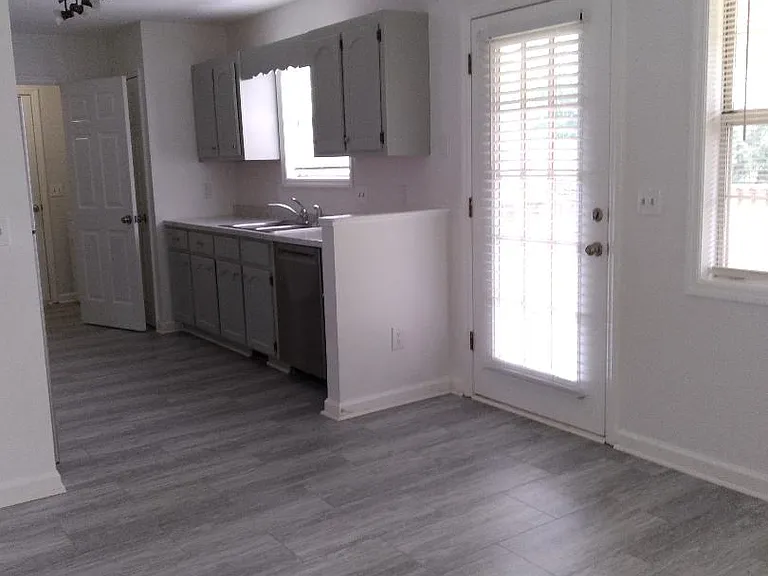 Dining/Kitchen/door to deck