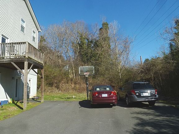 Some of the parking area & basketball goal