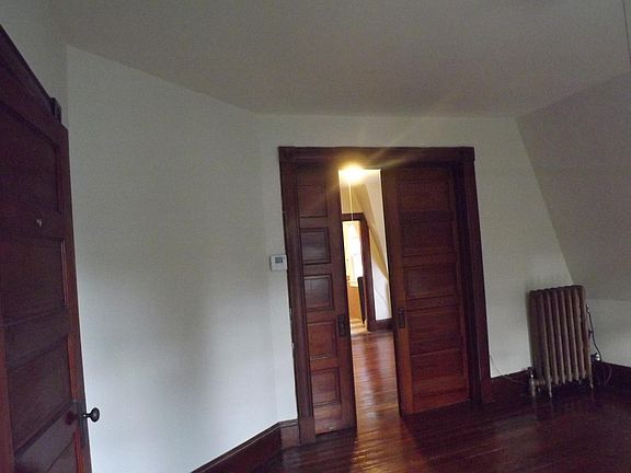 One bedroom looking into living room
