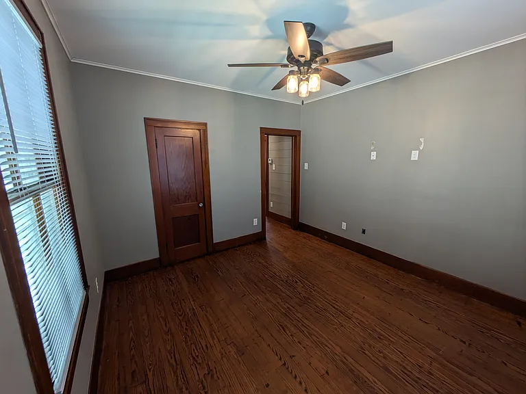 Bedroom 2 has ceiling fan, ample electrical outlets including for wall mount TV.