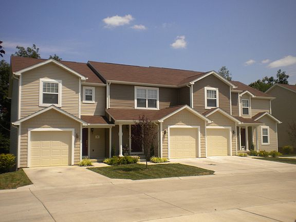 The "ASHWOOD" design, second from right, 3 bedrooms, 2 1/2 baths, basement and garage.