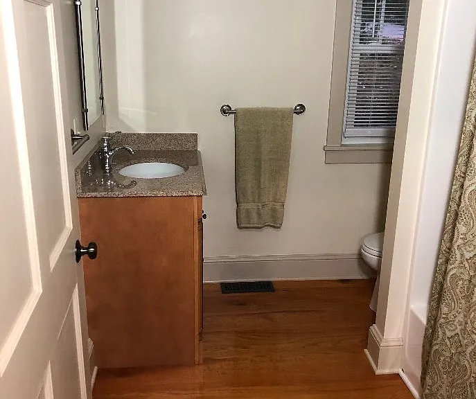 1st floor full bathroom with TOTO toilet and bathub/shower