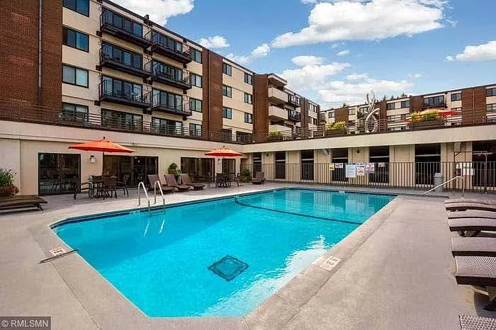 Pool next to community room and guest parking