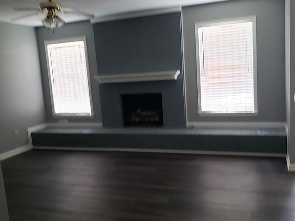 Den area with fireplace
