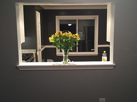 View from dining room with into eat-in kitchen