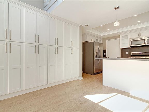 Lots of custom storage in nook and pantry