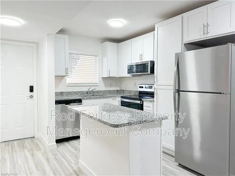 11931 Palm Bay Ct #102 — Photo 2