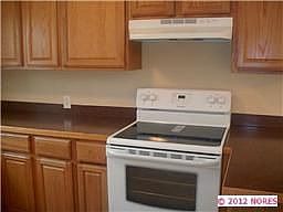 3rd Kitchen view  New stove, vent hood, counter tops