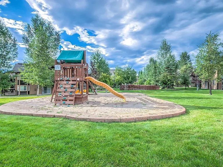 There is a playground and tons of open grass areas in the complex.
