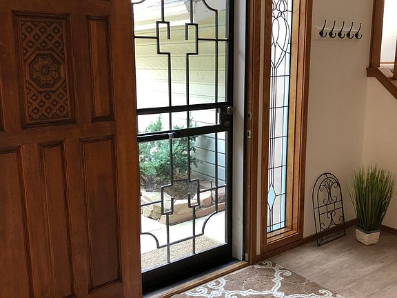 Front Entry with Stained Glass and New Hardwood Floor